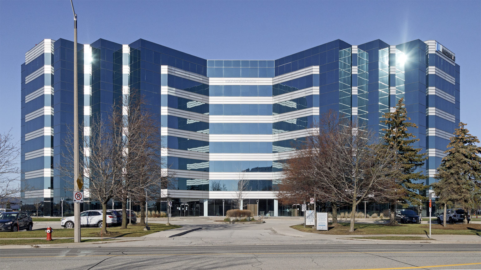 20211224. The blue glass building in the business park (with a ...